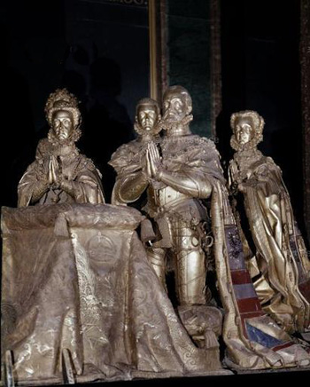 Philip II praying with his family