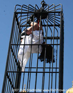 Homosexual cage mockery dance