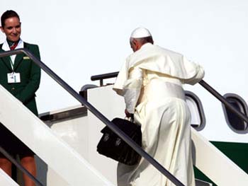 carrying suitcase Pope