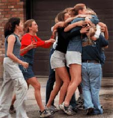 A group of youths Hugging