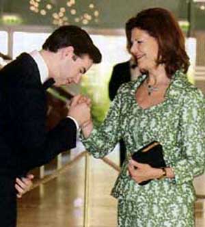 The heir of Luxembourg greeting Queen Silvia of Sweden