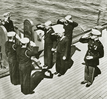 Sailors saluting a superior officer
