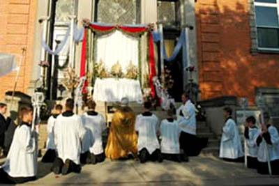 Traditional and reverent veneration of Our Lord in an outdoor ceremony