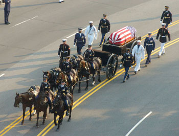A horse drawn Military Funeral procession
