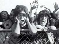 A group of frenzied Beatles fans