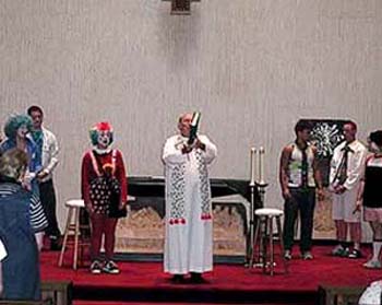 A clown standing on the altar during mass