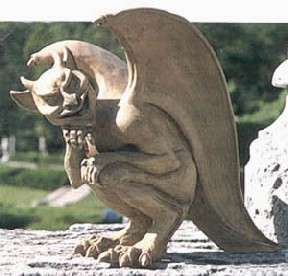 A smiling demonic statue