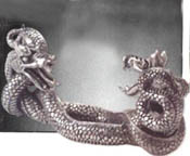 Two dragons coiled as a sword display