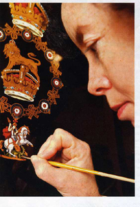 Paula Churhc painting the emblem of St. George