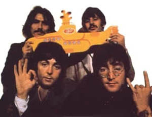 The Beatles posing, with John Lennon making a satanic hand gesture