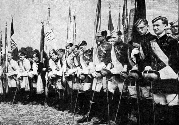 a black and white photograph of Catholic German youths in uniforms