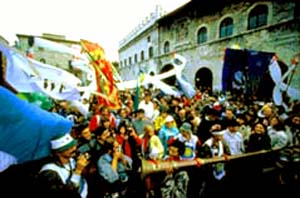 a crowd of mixed religions in Assisi