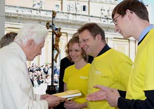 Pope Benedict XVI receives a copy of YouCat