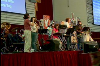 The band prepares for protestant songs