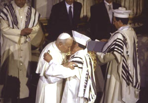 John Paul II embracing a rabbi of Rome