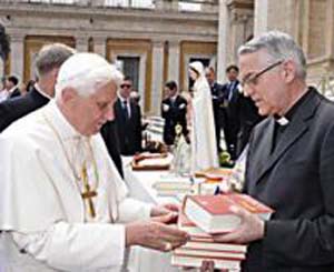 Bernard Lonergan offers Benedict his book