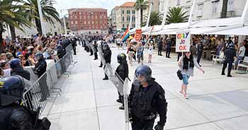 Split police protect the gay pride parade