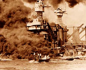 the USS West Virginia burns in Pearl Harbor