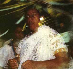 A women being possessed duing an umbanda ritual