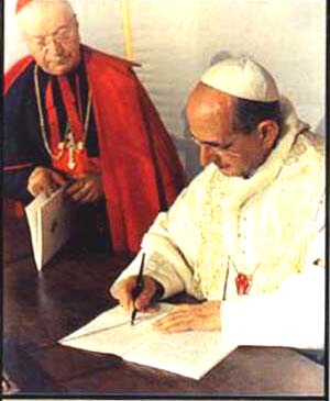Paul VI signing Populorum progressio