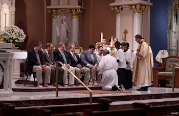 men washing feet