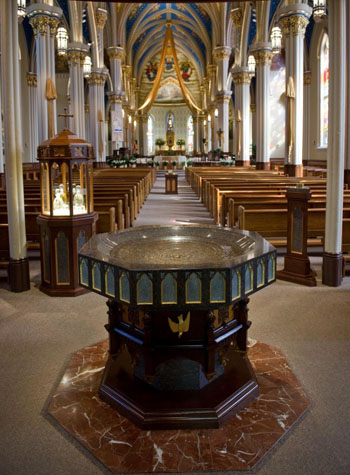 Traditional baptismal font in the basilica of the Sacred Heart