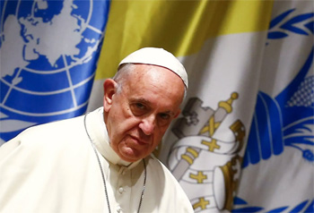 Pope Francis with a flag of the UN