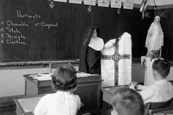 Nuns teaching in a vintage school photograph