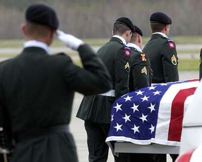 The coffin and funural of a Louisiana Guard killed in Iraq