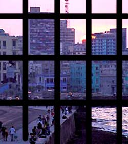 A view obstructed by prison grating in Cuba
