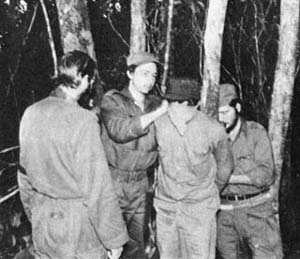Raul Castro preparing to kill one of his soldiers