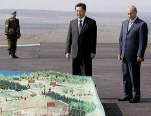 Putin and Jiang Zemin observing War Games in the Ural mountains