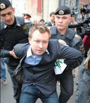 Police arrest a protester in Russia