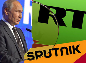 Vladimir Putin next to the logos of RT and Spitnik