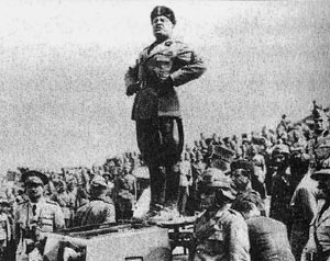 Mussolini posing with his troops