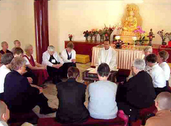 buddhists Catholic pray