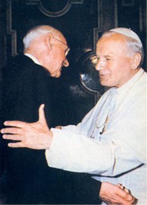 von Balthasar embracing John Paul II