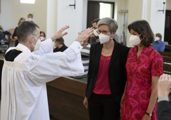 Priest blessing lesbian same sex marriage