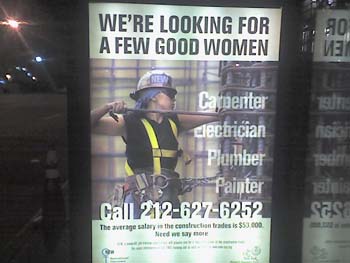 An advertisement showing a woman construction worker
