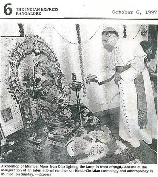 Card. Dias lighting a lamp to honor Hindu god Ganesha