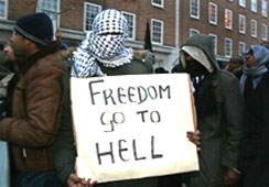An anti-freedom sign held by a Muslim