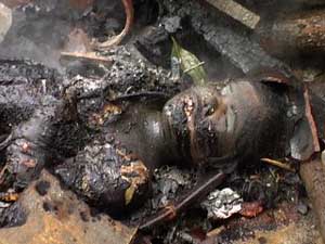 The burned corpse of Rajani Majhi