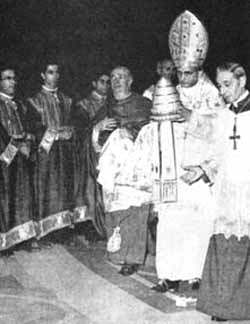 Paul VI giving away the Papal Tiara