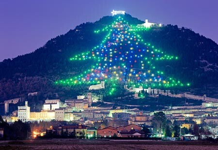 A mountain with a Christmas tree patter on it in Italy