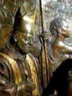 A bronze relief detail showing Bishop Weakland