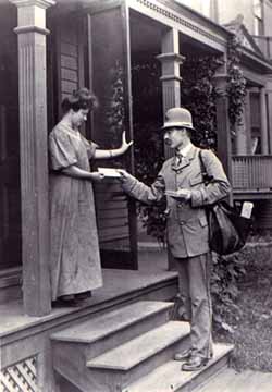 a photograph of a Mailman delivering a letter in 1905