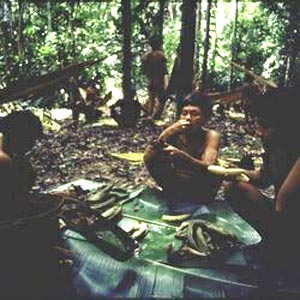 Yanomami Indians sitting in a jungle