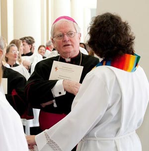 a Bishop with a woman priest