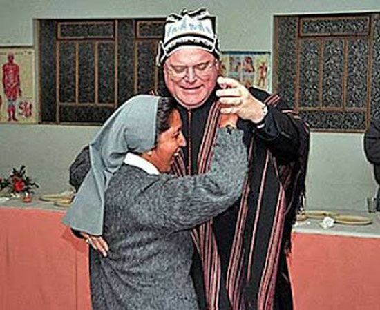 a photograph of a nun dancing with a man who might be Cardinal Marx