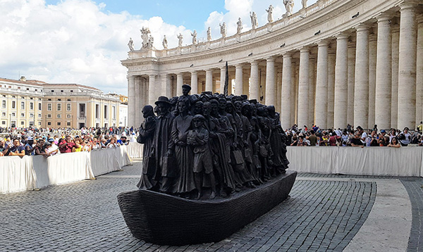 vatican immigrant sculpture